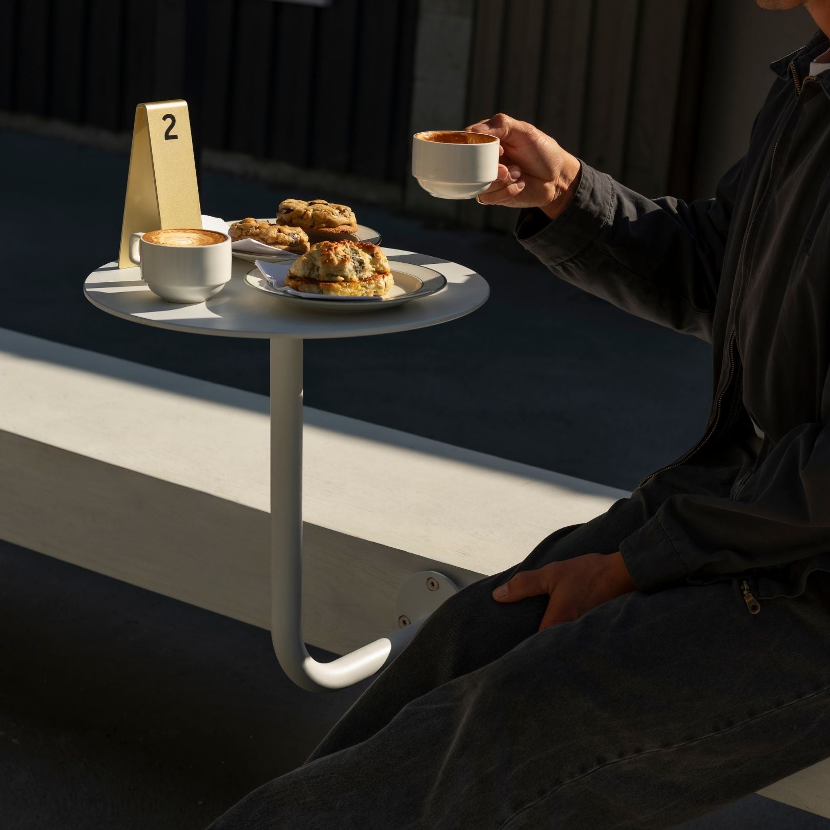 white outdoor mounted cafe table