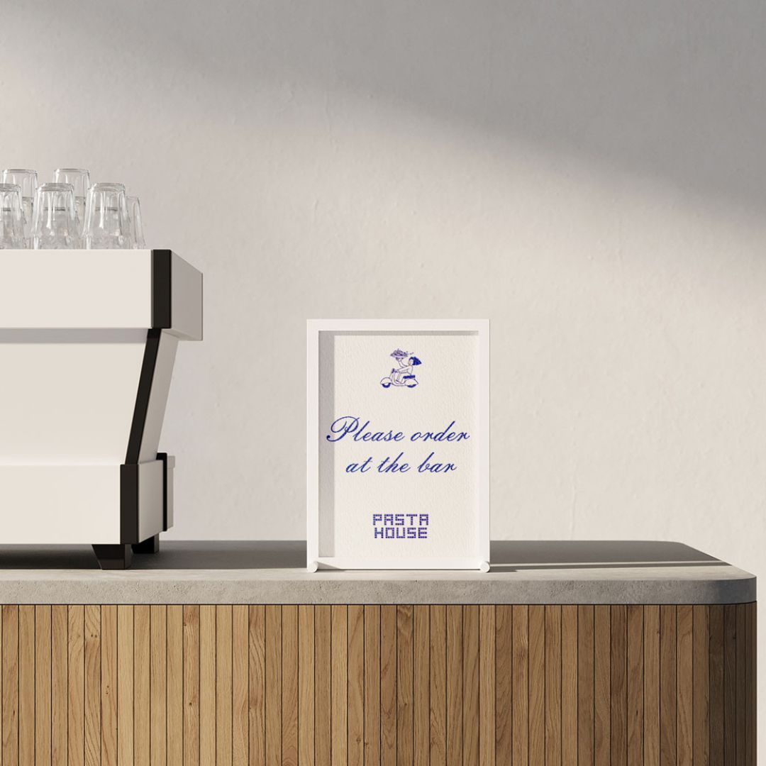 White countertop sign holder