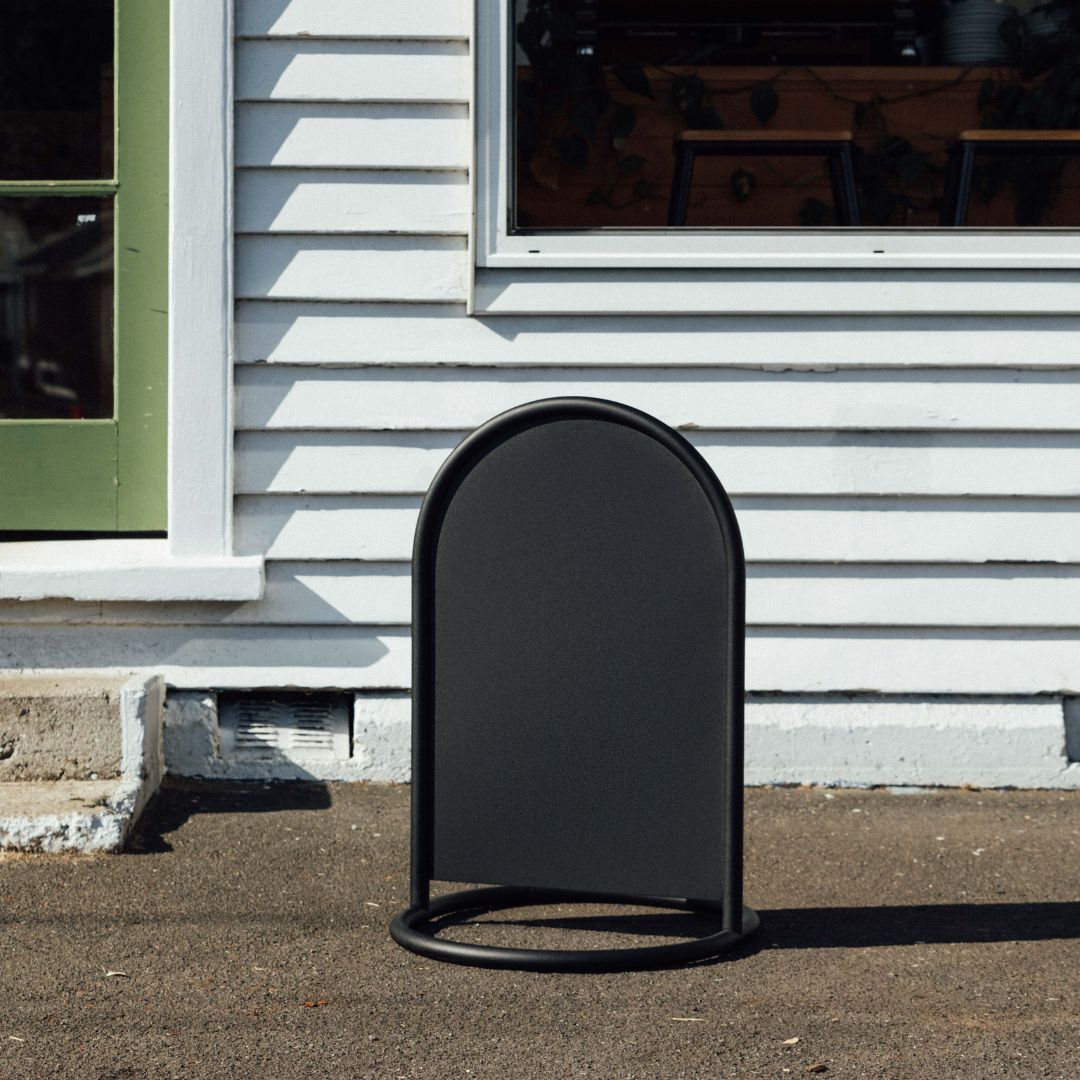 Rounded Sidewalk Sign. - George and Willy